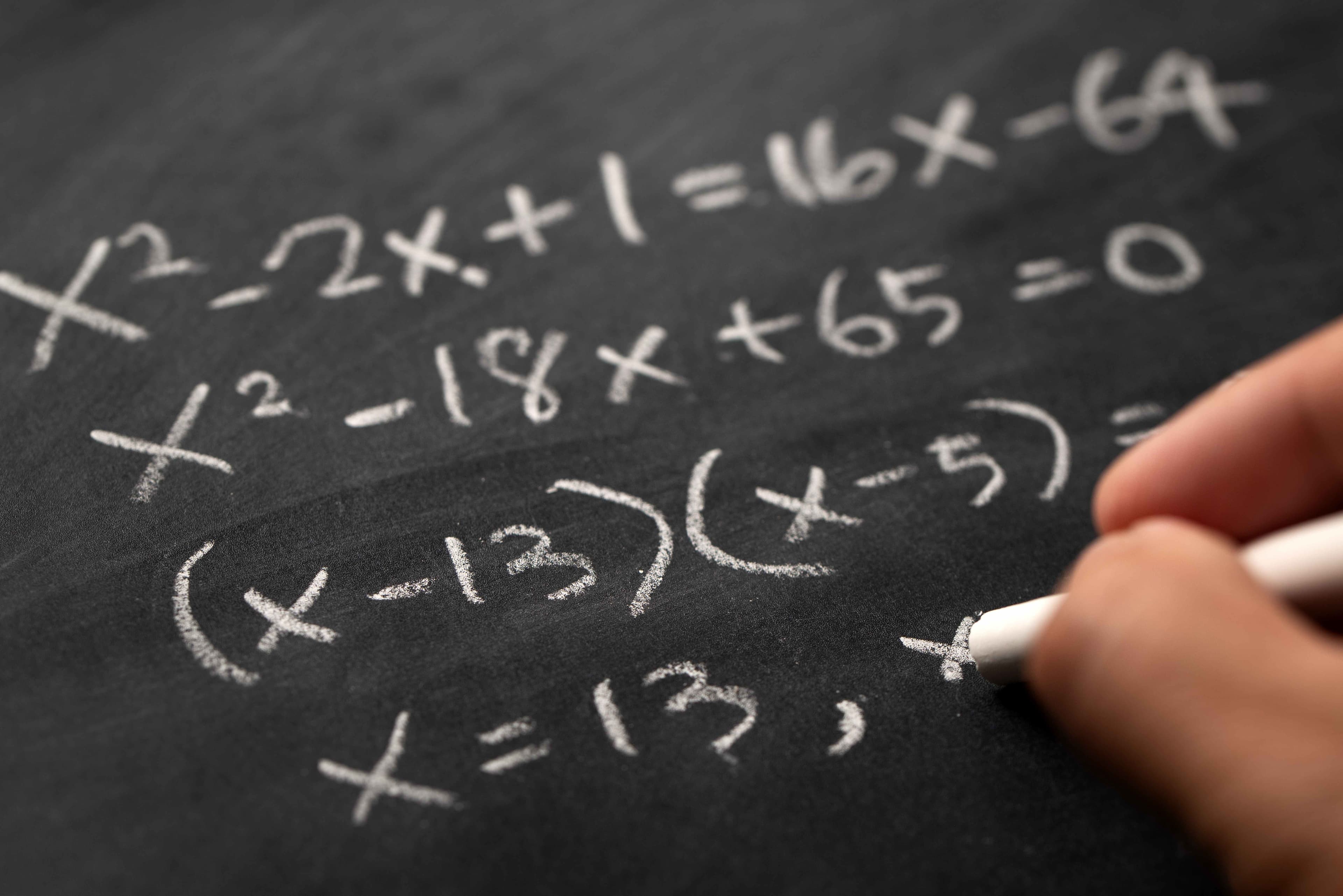 Mathematical equations representing perfect numbers and cybersecurity complexity